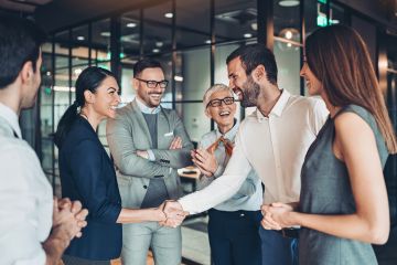 Team agreeing or meeting each other