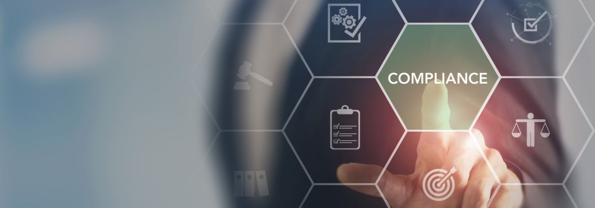 Business professional touching a digital interface highlighting “Compliance” with legal and governance icons.